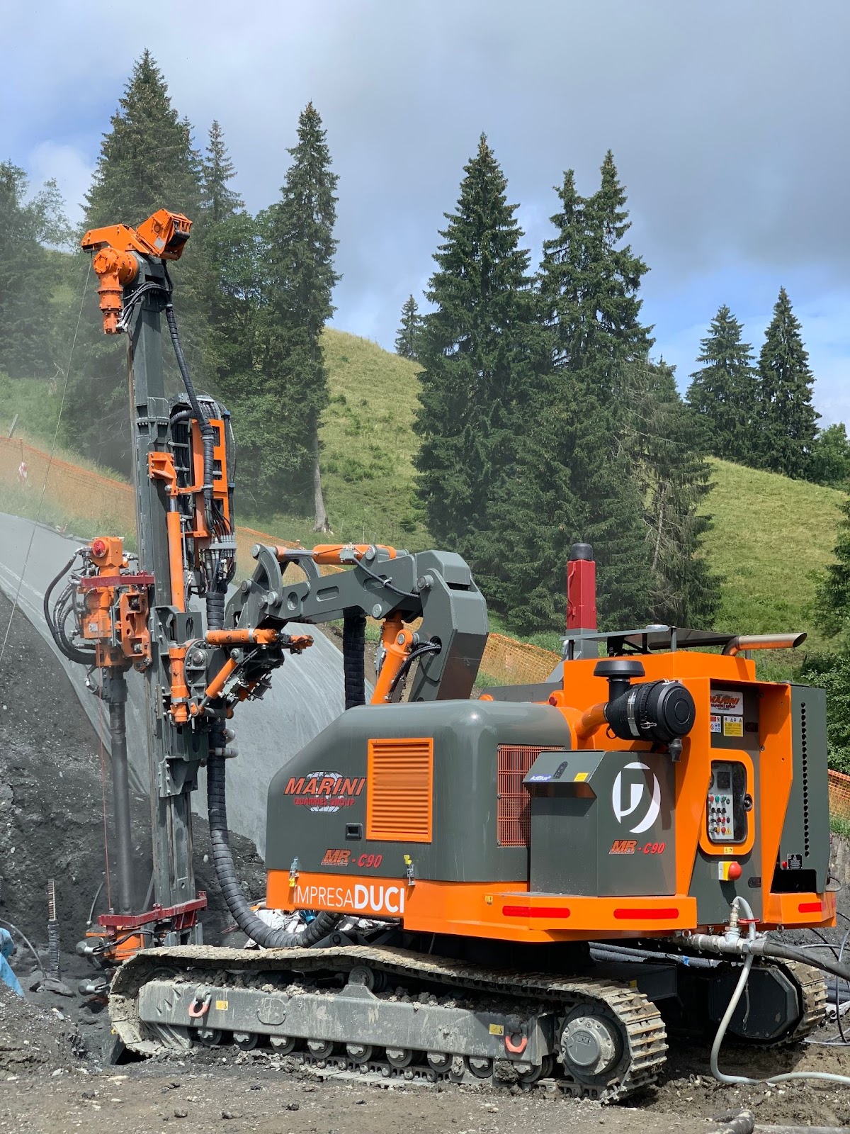 This image shows a Marini MR-C90 (or MR-C 90), a radio-controlled hydraulic crawler drilling rig manufactured by Marini S.r.l. (part of Marini Quarries Group) in Italy.